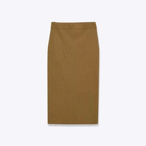 Detail of camel rib-knit midi skirt showing vertical texture and elastic high waist