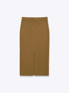 Detailed view of brown knit midi skirt featuring ribbed texture and front slit design