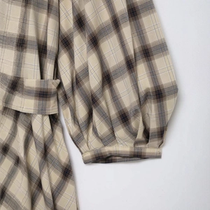 Plaid round neck summer dress featuring classic check pattern and belted waist design