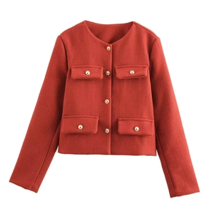 Close-up of deep red tweed jacket featuring classic gold metal buttons and four pockets