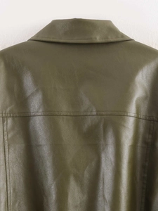 Detail shot of the olive green PU leather jacket back with horizontal decorative stitching