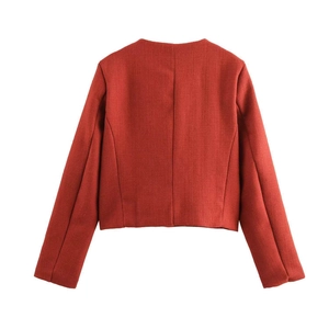 Rear view of cropped brick red tweed jacket showing premium textured weave and boxy fit