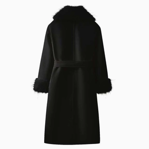 Long black wool coat with fur collar and belted waist shown from the back view
