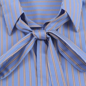 Relaxed blue and brown vertical striped long sleeve shirt with a classic bow tie neckline