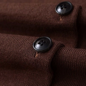 Retro dark brown short sleeve knit cardigan with detailed texture and black buttons