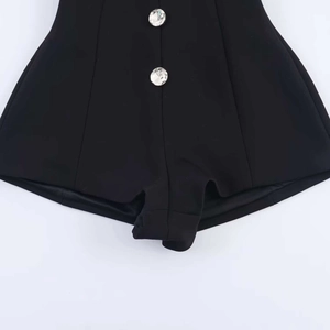 Elegant black high-waisted romper with decorative sparkling crystal jewelry buttons