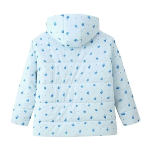 Detail of light blue floral hooded puffer jacket with navy flower print and quilted texture