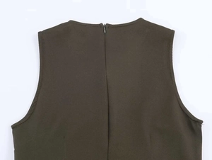 Detail view of olive green midi dress featuring a seamless back zipper and round neckline