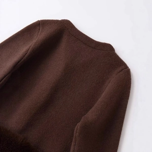 Dark brown knitted sweater with faux fur trim and soft cashmere texture detail