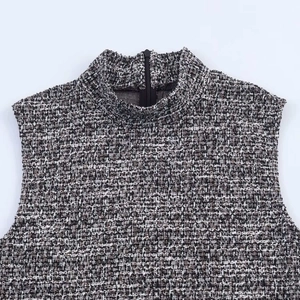 Chic sleeveless tweed dress with high collar and back zipper detail in grey texture