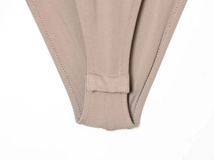 Close-up of the reinforced crotch area with fine double-needle stitching on bodysuit