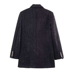 Women's black tweed blazer with metallic button cuffs shown from the back view