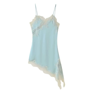 Pale blue silk slip dress with lace trim and asymmetrical hemline on white background