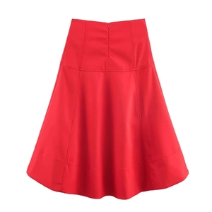 Vibrant red high-waisted A-line flared skirt with structured seams and hidden zipper