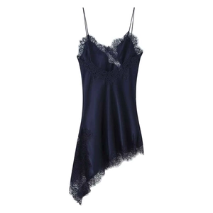 Detail of navy blue satin dress with delicate lace trim and asymmetric hemline