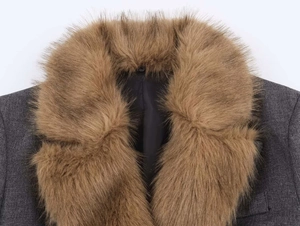 Macro detail of dark grey wool blazer with high-quality faux fur lapel and thick texture