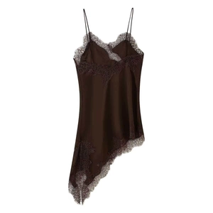 Detail of coffee satin dress with black eyelash lace trim and asymmetric hemline