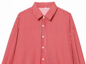 Close-up of red and white striped shirt collar showing size L tag and button details