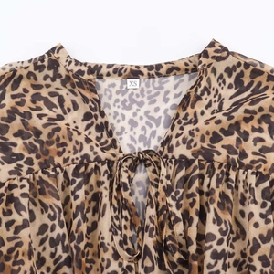 Women's V-neck long sleeve dress with classic leopard print and neck tie detail