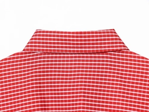Close-up of the red and white checkered shirt collar with high-quality stitching detail