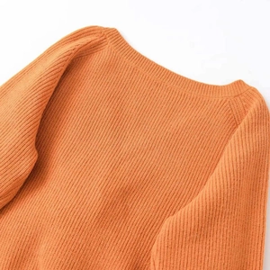 Chic orange crewneck knit sweater featuring premium vertical ribbed texture for women
