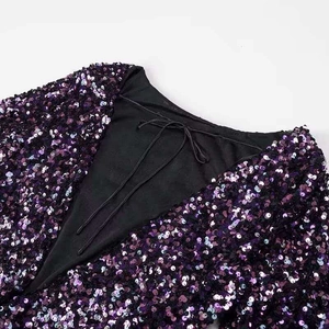 Elegant purple gradient sequin dress with deep V-neck and black drawstring detail