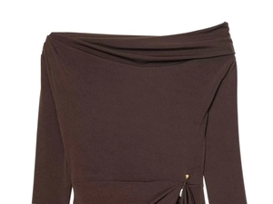 Detail view of brown off-shoulder dress featuring pleated waist and golden stud accents