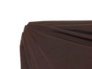 Detailed close-up of dark brown knitted fabric with elegant ruched draped pleats texture
