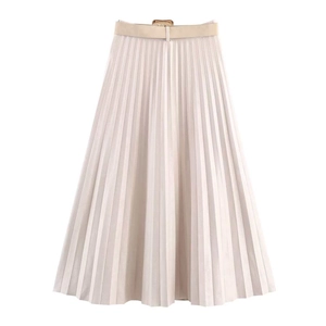 Detail of elegant beige pleated midi skirt with matching belt and golden metal buckle