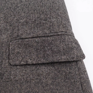 Classic herringbone pattern blazer for women featuring detailed flap pocket and wool texture