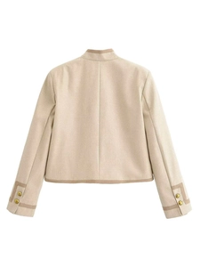 Detail view of the back of a beige cropped blazer featuring a stand collar and gold buttons