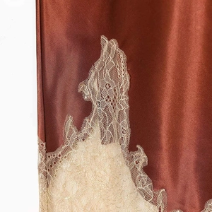 Lace trim satin skirt in dark brown silk texture with elegant floral detailing