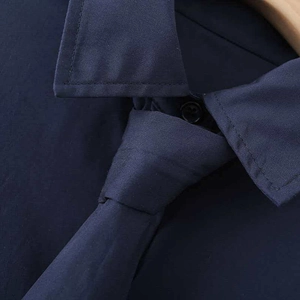 Classic dark blue poplin long sleeve shirt with matching narrow tie and black buttons