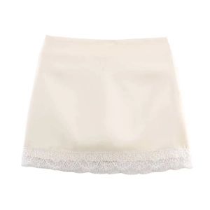Elegant cream satin mini skirt for women featuring a delicate white lace scalloped hem