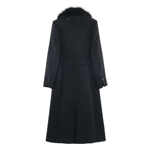 Women's long black wool coat with faux fur collar and waist belt, back view on white background