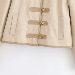 Beige cropped jacket with vintage gold buttons and textured cotton-linen fabric