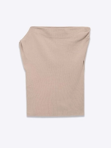 Detail showing the fine ribbed texture and premium beige knit fabric of the slim top
