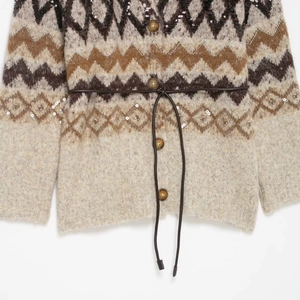 Ethnic knit cardigan with sequins, geometric patterns, and brown waist belt