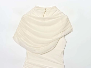 Detail view of ruched mesh high neck with button closure on ivory bodycon dress