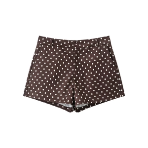 Women's high-waisted dark brown mini shorts with white polka dots and classic A-line design