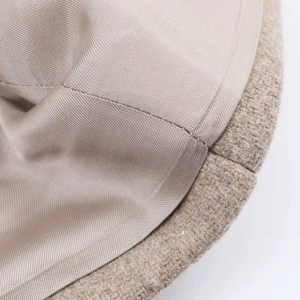 Macro shot of wool blend fabric texture and twill silk lining of the winter coat