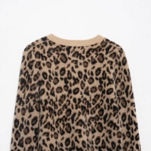Round neck leopard print knit sweater with fuzzy faux mink texture in brown and black