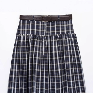 Classic plaid midi skirt in navy blue and white with a brown faux leather belt