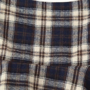 Haut à carreaux pour femme en bleu marine et marron avec texture en laine détaillée