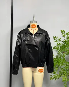 Detail of black PU leather biker jacket featuring wide lapels and silver metal snaps