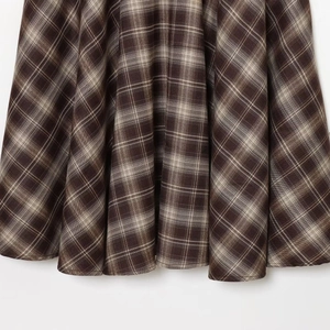 Jupe longue trapèze à carreaux marron pour femme avec taille haute et ourlet fluide