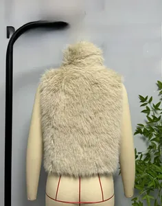 Rear view of fuzzy beige faux fur vest showing soft texture and sleeveless cut