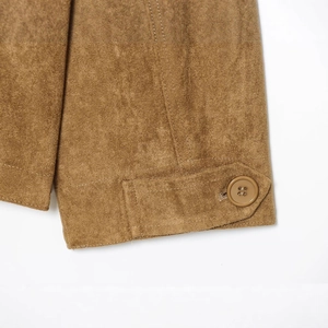 Women's brown faux suede jacket with buttoned cuffs and detailed stitching on sleeves