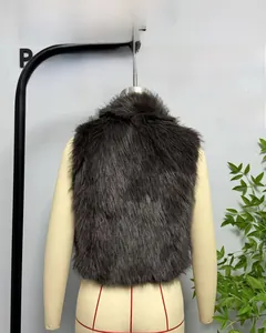 Detail view of the plush texture and back design on a dark gray faux fur vest