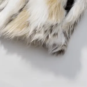 Detailed close-up showing soft faux fur texture with elegant white and beige animal spots